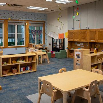 Toddler Classroom, showing the loft, quiet area, and block area..